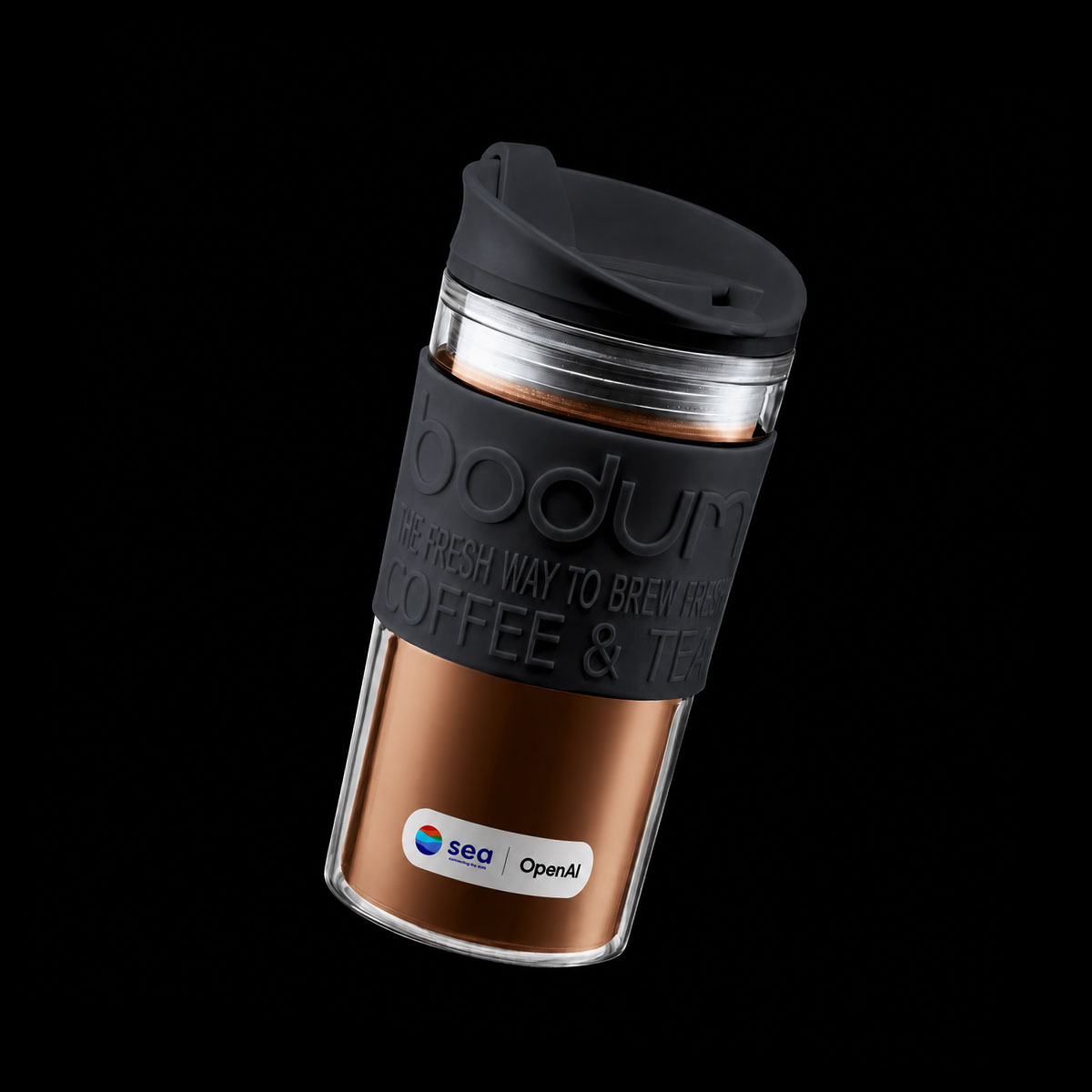 Black mug with the sea and OpenAI lockup